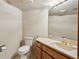 Bathroom with a vanity, an oval sink, and a toilet at 562 Pine Valley Se Rd, Marietta, GA 30067