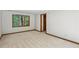 Simple bedroom with neutral carpet and trim, and a window offering natural light at 562 Pine Valley Se Rd, Marietta, GA 30067