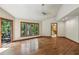 Bright bedroom with hardwood floors, large windows and access to a private balcony at 562 Pine Valley Se Rd, Marietta, GA 30067