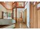 Warm home entryway featuring hardwood floors, a wood ceiling, and open floorplan at 562 Pine Valley Se Rd, Marietta, GA 30067