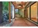 Covered patio with a stone water feature and views of lush landscaping at 562 Pine Valley Se Rd, Marietta, GA 30067