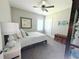 Comfortable bedroom with neutral tones, a ceiling fan, and tasteful decor at 848 Rolling Nw Hl, Kennesaw, GA 30152