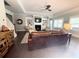 Cozy living room featuring a fireplace and built-in shelving at 848 Rolling Nw Hl, Kennesaw, GA 30152