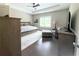 Spacious main bedroom featuring tray ceiling, and seating area at 848 Rolling Nw Hl, Kennesaw, GA 30152