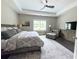 Serene main bedroom with tray ceiling, and plenty of natural light at 848 Rolling Nw Hl, Kennesaw, GA 30152