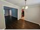 Dining room featuring hardwood floors, neutral walls and an adjacent kitchen at 1106 Sharonton Way, Stone Mountain, GA 30083