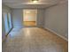 The living room features tiled flooring and access to the outdoors through glass doors at 1106 Sharonton Way, Stone Mountain, GA 30083