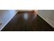 Living room featuring beautiful hardwood floors and gray painted walls at 1106 Sharonton Way, Stone Mountain, GA 30083