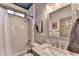 Bathroom featuring marble vanity, patterned wallpaper, and shower-tub combo at 127 Bradshaw Park Dr, Woodstock, GA 30188