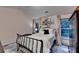 Cozy bedroom with decorative iron bed frame, soft textiles, and natural light from the large windows at 127 Bradshaw Park Dr, Woodstock, GA 30188