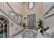 Inviting foyer with high ceilings, neutral colors, and decorative rug at 127 Bradshaw Park Dr, Woodstock, GA 30188