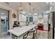 Modern kitchen with stainless steel appliances, a large island, and a red range at 127 Bradshaw Park Dr, Woodstock, GA 30188