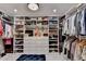 Spacious walk-in closet with custom shelving and storage solutions for shoes, clothes, and accessories at 127 Bradshaw Park Dr, Woodstock, GA 30188