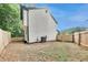 View of backyard featuring a wooden fence and HVAC system at 131 Turning Point, Stockbridge, GA 30281