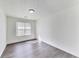 Clean bedroom showcasing modern floors and a bright window at 131 Turning Point, Stockbridge, GA 30281