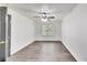 Bright bedroom featuring modern flooring and a window allowing natural light at 131 Turning Point, Stockbridge, GA 30281