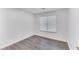 Bedroom with laminate flooring, simple decor and window for natural light at 131 Turning Point, Stockbridge, GA 30281