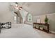 Bright bonus room with unique ceiling and includes a built-in window seat and decorative shelving at 3090 Creek Tree Lane, Cumming, GA 30041
