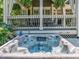 Inviting backyard hot tub with seating space for relaxation; landscaped and peaceful at 3090 Creek Tree Lane, Cumming, GA 30041