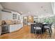 Open kitchen with white cabinets, stainless steel appliances, granite countertops, and a center island at 3090 Creek Tree Lane, Cumming, GA 30041