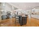 Open living room with a fireplace and ample seating at 3090 Creek Tree Lane, Cumming, GA 30041