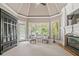 Bright sitting room with lots of natural light and cozy seating at 3090 Creek Tree Lane, Cumming, GA 30041