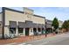 Exterior view of Smokejack restaurant with a brick facade, enhancing its character and street presence at 11715 Dancliff Trce, Alpharetta, GA 30009