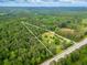 A beautiful aerial view of the approximate outlined lot lines situated on 10.08 +/- acres of land at 4380 Highway 138, Oxford, GA 30054