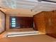 View of the front door with decorative wall paneling in the entryway at 4380 Highway 138, Oxford, GA 30054