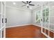 Office space with French doors, hardwood floors, and ample natural light at 7160 Fawn Lake Dr, Alpharetta, GA 30005