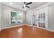 Office space with French doors, hardwood floors, and ample natural light at 7160 Fawn Lake Dr, Alpharetta, GA 30005