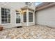 Outdoor patio space with access to the home's backyard at 7160 Fawn Lake Dr, Alpharetta, GA 30005