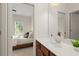 Bathroom vanity with view into bedroom, offering a seamless and stylish transition at 1215 Renaissance Se Ct, Mableton, GA 30126