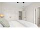 Cozy bedroom with white walls, a ceiling fan, and double door closet for plenty of storage at 1215 Renaissance Se Ct, Mableton, GA 30126
