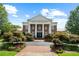 Beautiful clubhouse with manicured landscaping, creating an inviting entrance at 1215 Renaissance Se Ct, Mableton, GA 30126