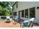 This home features a wooden deck with furniture and view to the trees at 1215 Renaissance Se Ct, Mableton, GA 30126