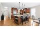 Spacious kitchen with stainless steel appliances, hardwood floors, and a large center island with seating at 1215 Renaissance Se Ct, Mableton, GA 30126