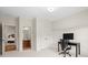 Office area featuring a desk and chair and views of a bedroom and a bathroom at 1215 Renaissance Se Ct, Mableton, GA 30126