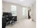 Cozy home office features modern decor, wainscotting and ample natural light at 1215 Renaissance Se Ct, Mableton, GA 30126