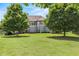 Gorgeous backyard with a large deck and mature trees providing shade and privacy at 2602 Alcovy Club Dr, Dacula, GA 30019
