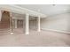 Basement area featuring carpeted floors, neutral paint, and potential for additional living space at 2602 Alcovy Club Dr, Dacula, GA 30019