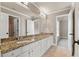 Bright bathroom with granite countertops and white cabinets in neutral decor at 2602 Alcovy Club Dr, Dacula, GA 30019