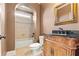 Bathroom with vanity and shower over tub at 2602 Alcovy Club Dr, Dacula, GA 30019