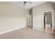 Bedroom featuring carpet flooring and a view of the en suite bathroom at 2602 Alcovy Club Dr, Dacula, GA 30019
