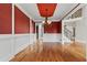 Dining area featuring hardwood floors, chandelier, and view of the staircase at 2602 Alcovy Club Dr, Dacula, GA 30019