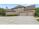 Beautiful brick home with three-car garage and well-maintained landscaping at 2602 Alcovy Club Dr, Dacula, GA 30019