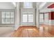 Bright, open foyer featuring hardwood floors and natural light at 2602 Alcovy Club Dr, Dacula, GA 30019