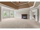 Expansive main bedroom with a fireplace, large windows, and an en-suite bathroom at 2602 Alcovy Club Dr, Dacula, GA 30019