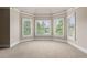 Bright sitting area with multiple windows providing lots of natural light at 2602 Alcovy Club Dr, Dacula, GA 30019