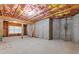 Unfinished basement showing insulation, framing, and potential for customization at 2602 Alcovy Club Dr, Dacula, GA 30019